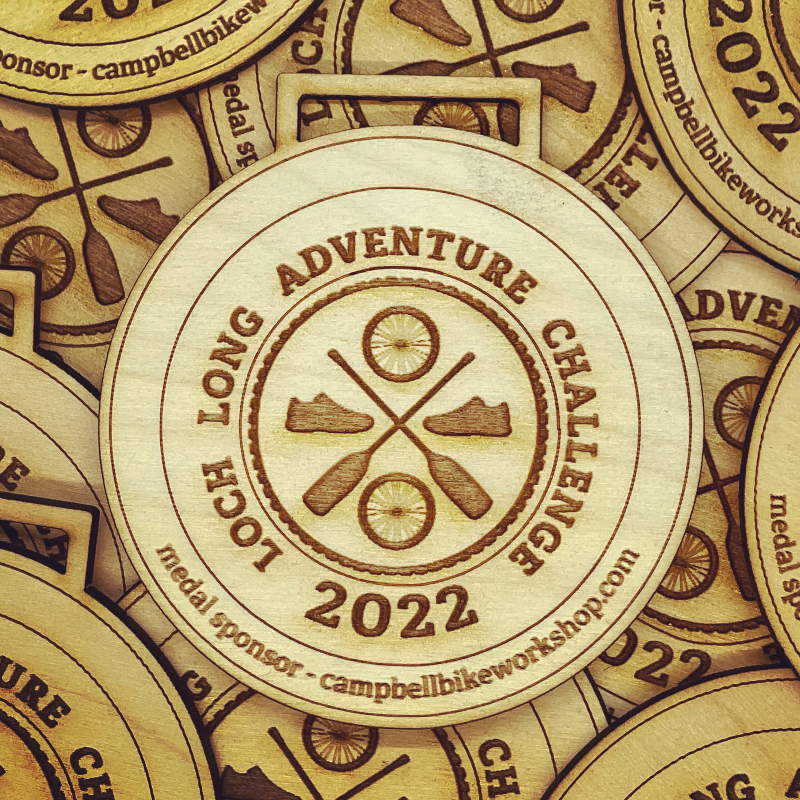 The medals designed by Ali Campbell for the Loch Long Adventure Challenge