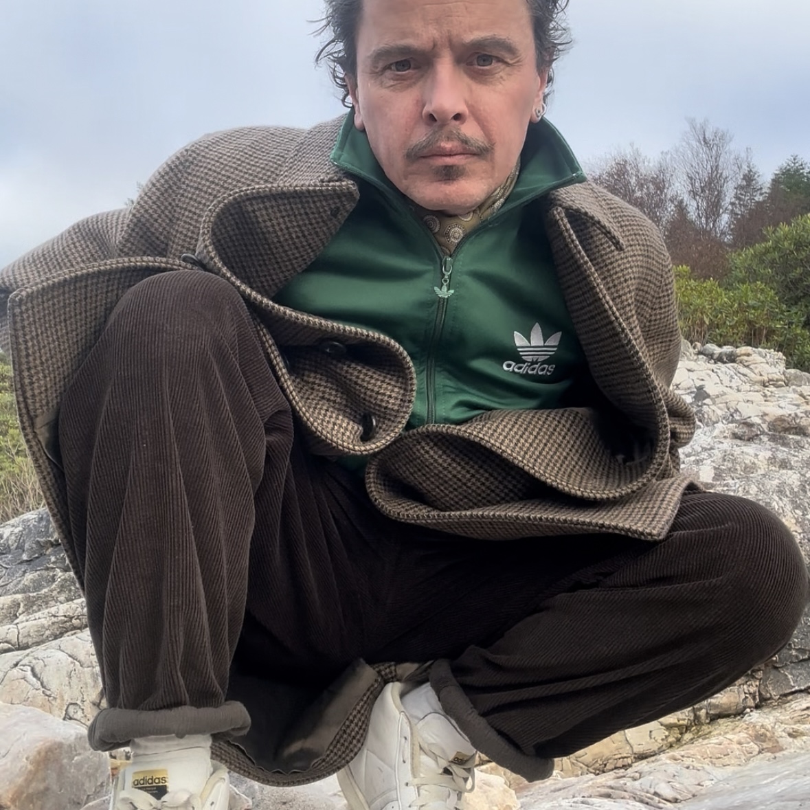 Ali Campbell showing off his latest outfit selection on the beach at Port Appin