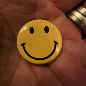 The classic smiley face badge