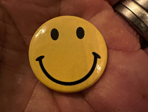The classic smiley face badge