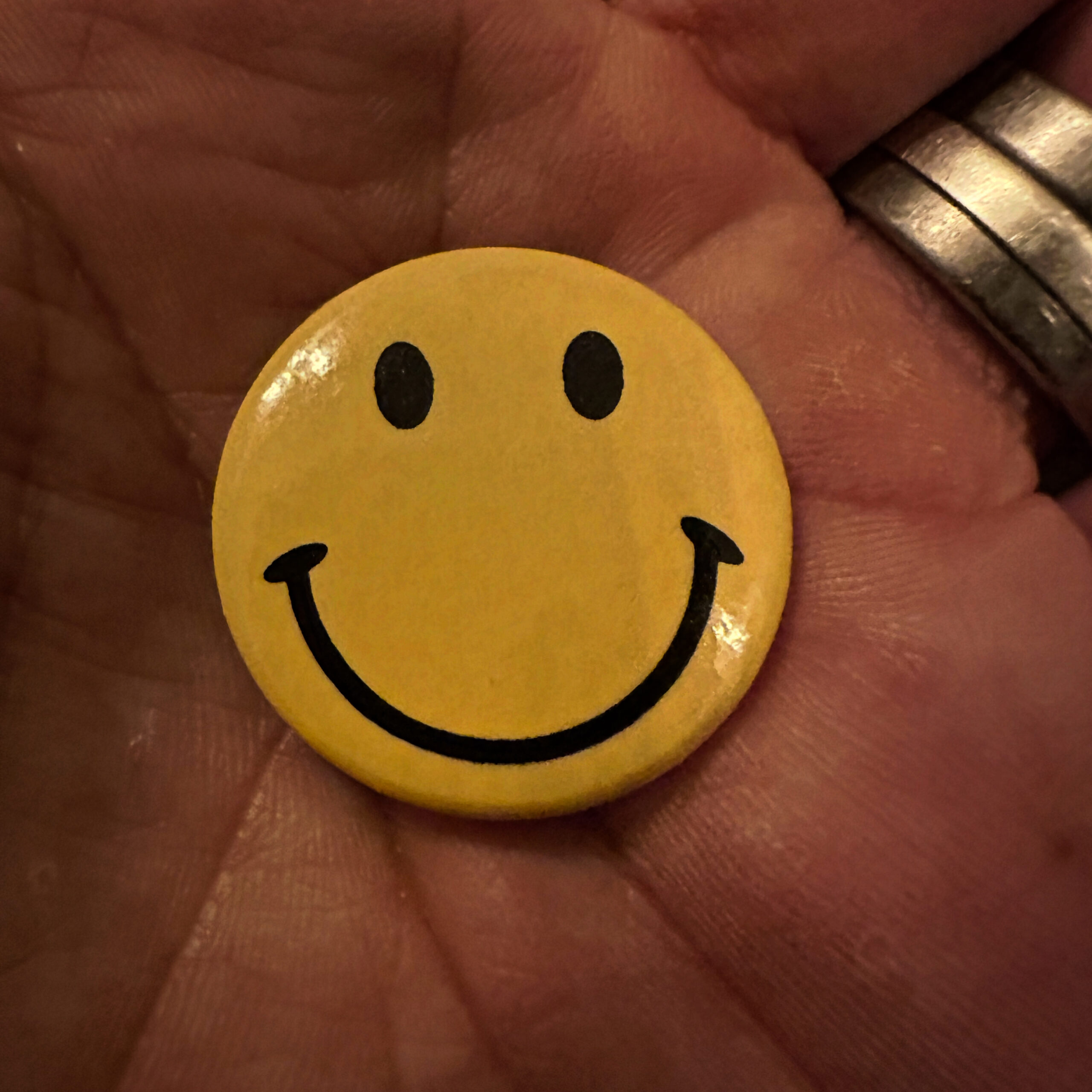 The classic smiley face badge